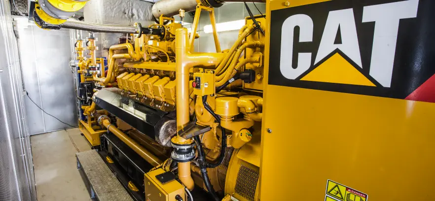 Motogenerador Caterpillar especializado en la combustión de biogás para la generación de energía eléctrica limpia.